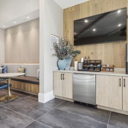 a kitchen with wooden cabinets